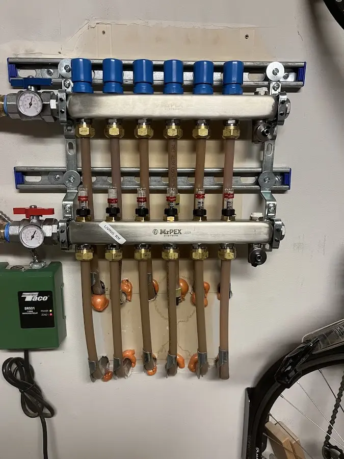 Plumber performing Water Heater Repair at a residential property in Wawarsing